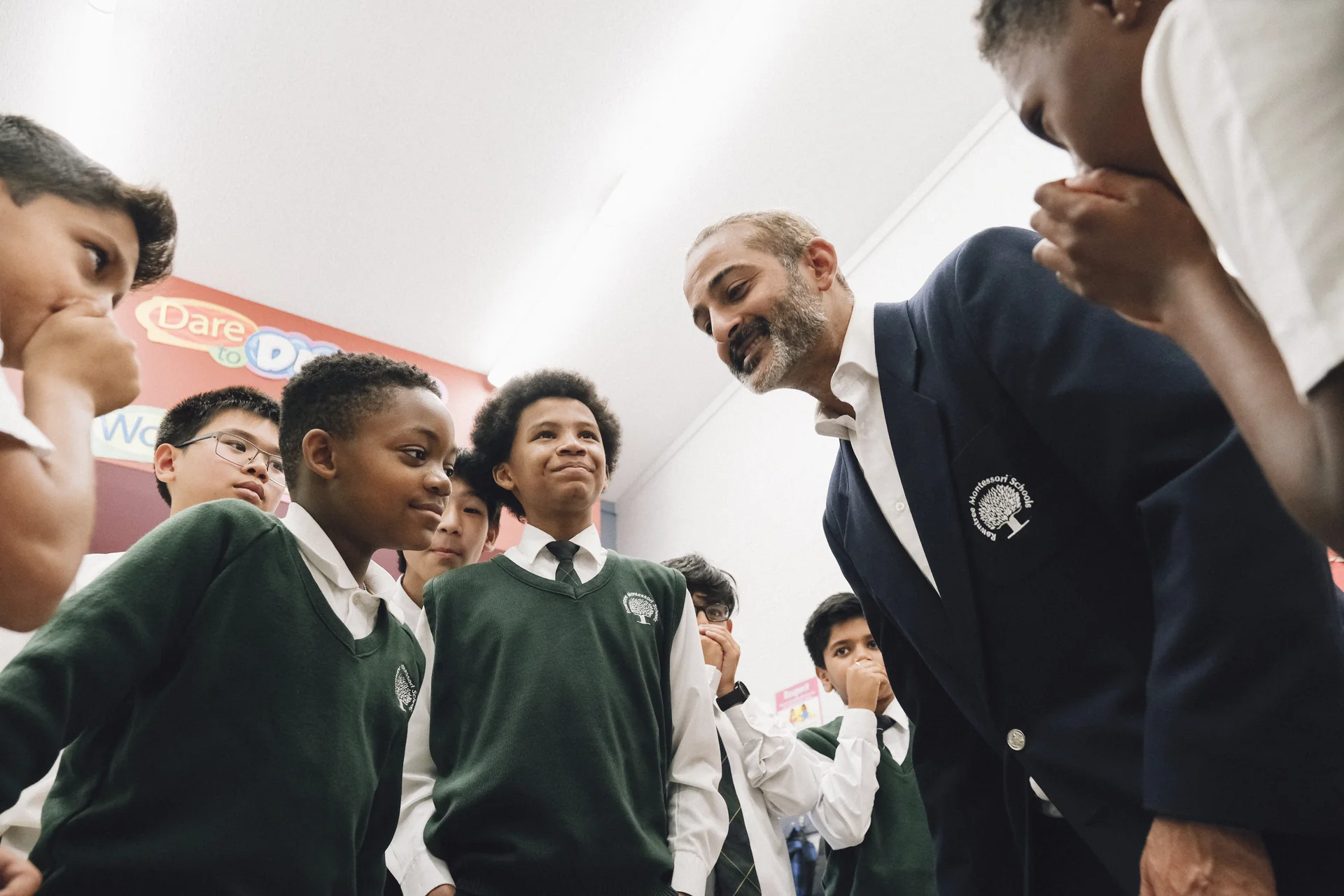 Teacher talking to a group of students
